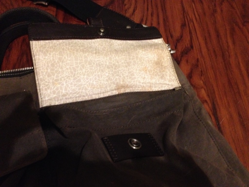 Here's a coffee stain in the flap of one the bag's pockets.